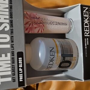Redken 01 gloss shine serum 2 oz. w/Maybelline Lip gloss in crushed candy